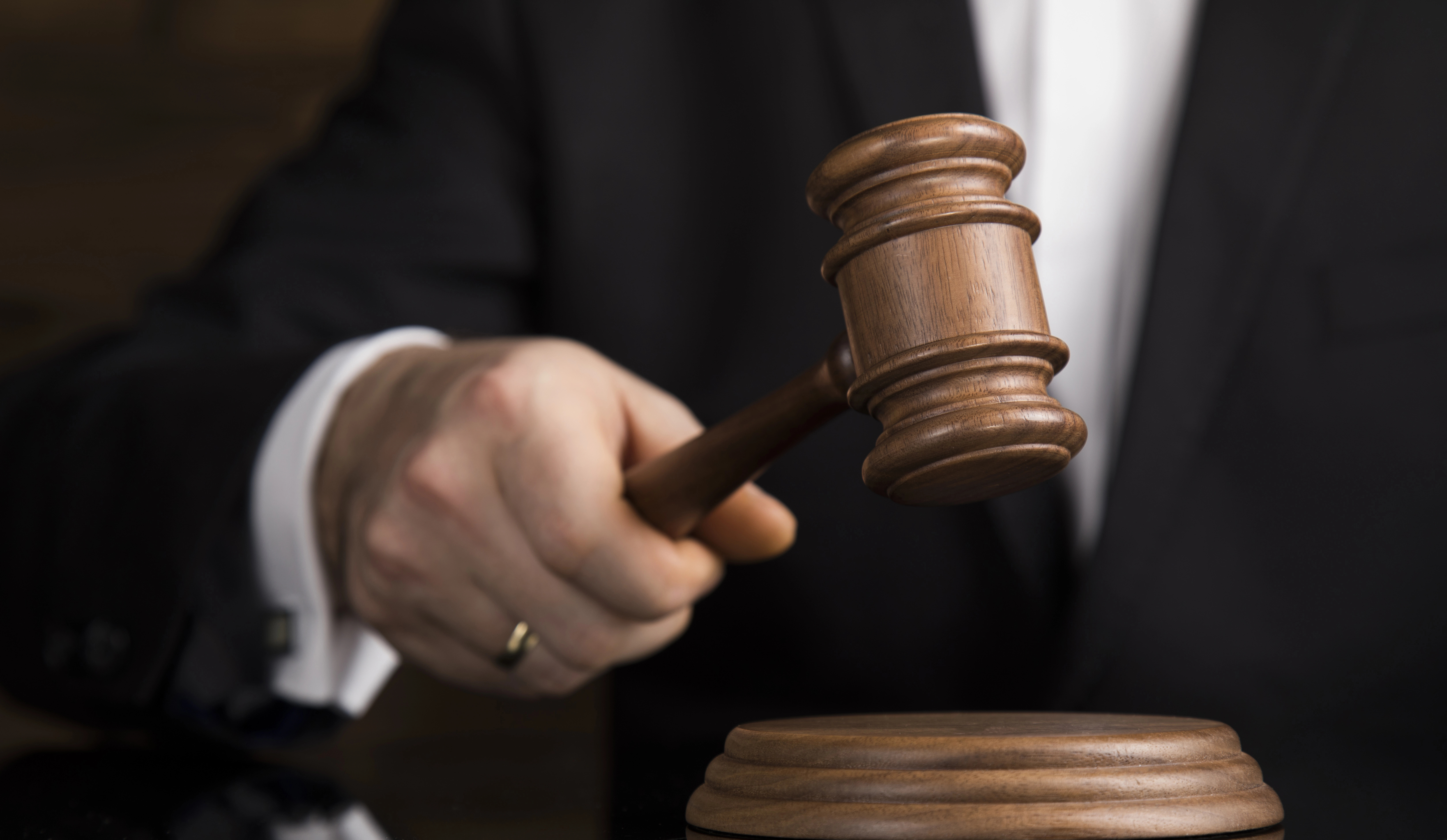 Judge using their gavel in court