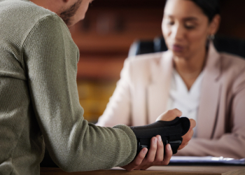 Injured person consulting with attorney