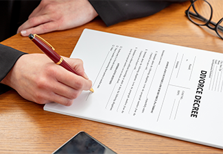 Lawyer signing paper of DIVORCE DECREE