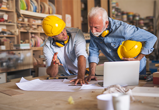Engineer is sharing his idea to his father