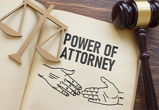 Power of attorney is shown using the text and photo of gavel