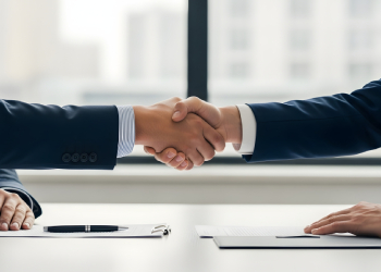 Businessmen shaking hand after agreement