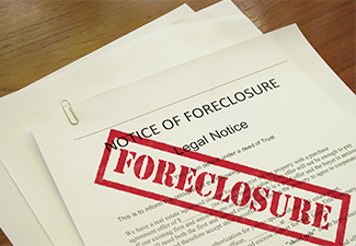 Mortgage foreclosure document with red stamped text