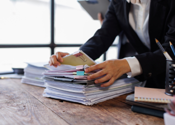 Auditor going through financial documents