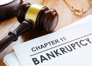 Chapter 11 Bankruptcy file in table with gavel