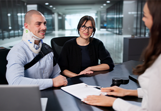 Injured Worker Smiles As Lawyer Settles Personal Injury Claim