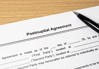 Legal document Postnuptial Agreement on paper close up