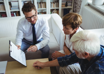 Old Couples consulting with estate planning attorney