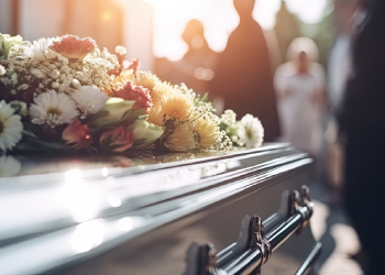 Flowers on coffin at a funeral