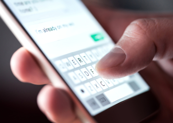 Man sending text message