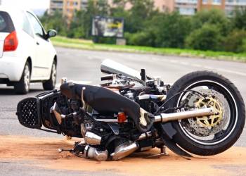 Crashed Motorcycle after accident on road