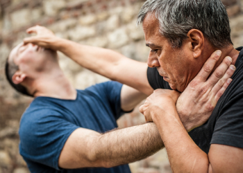 Men assaulting each other
