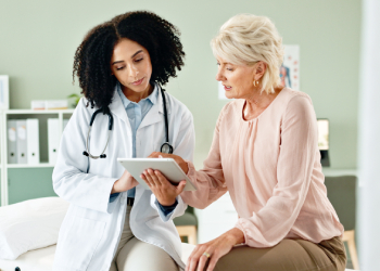 Doctor and Patient reviewing health progress