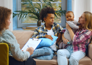 Foster parent speaking with social worker