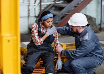 Injured women at a workplace
