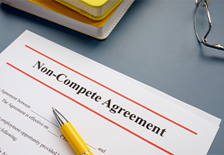 Non compete agreement NCA in the office table