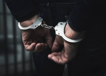 Handcuffed hands of a man