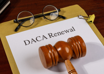 DACA Renewal Document with Gavel and Pen