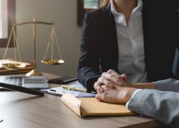 Lawyer meeting and consoling solution to his client