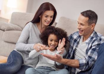 Parents with their adopted child
