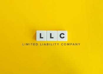 Limited Liability Company (LLC) in wooden block