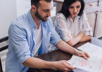 Couples reading Foreclosure final notice