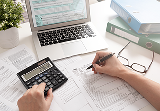 Accountant working with US tax forms