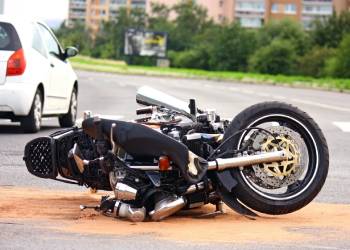 Crashed motorcycle in road