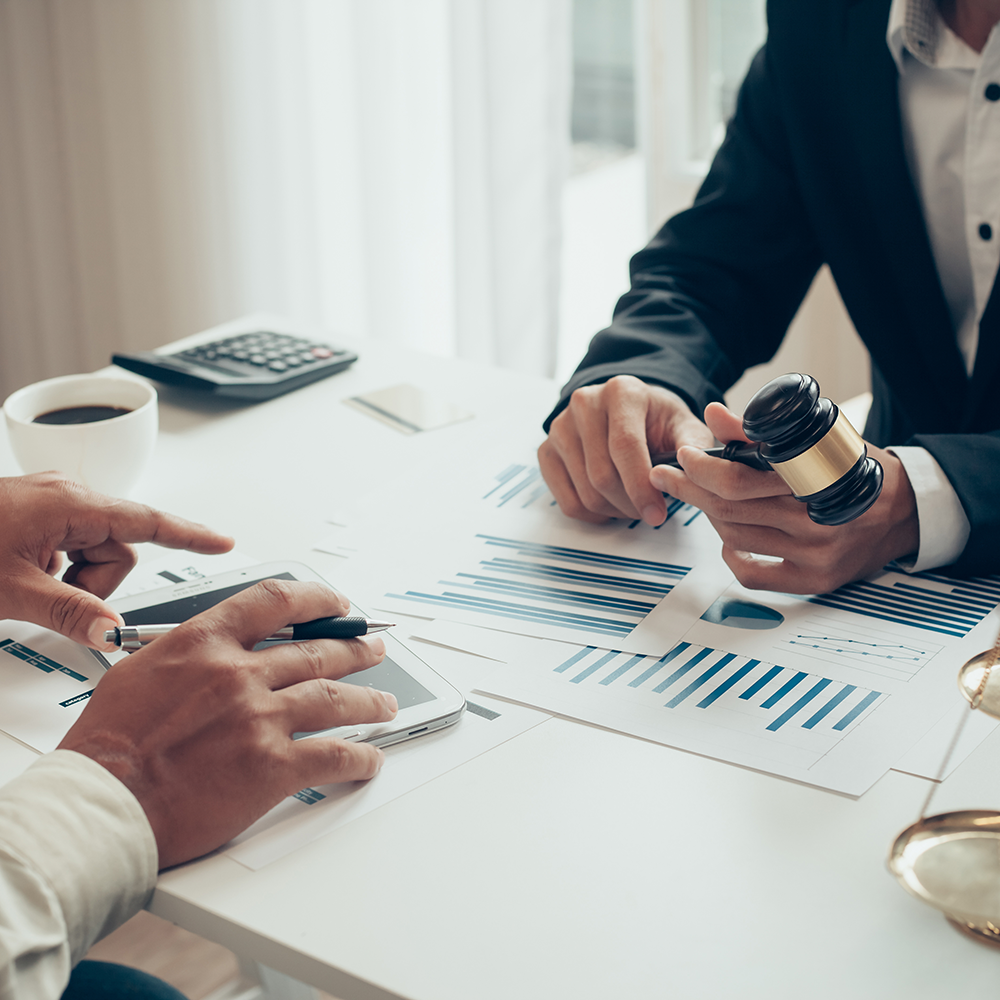 Business lawyer working about legal legislation in courtroom to help their customer