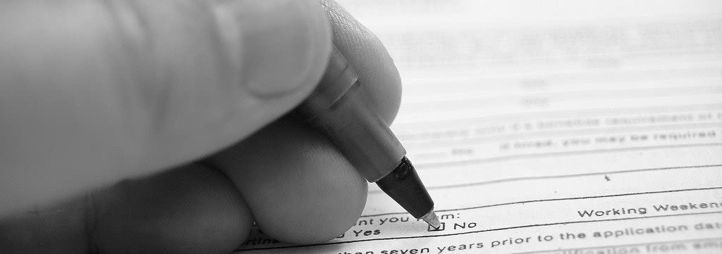 person checking no on a form