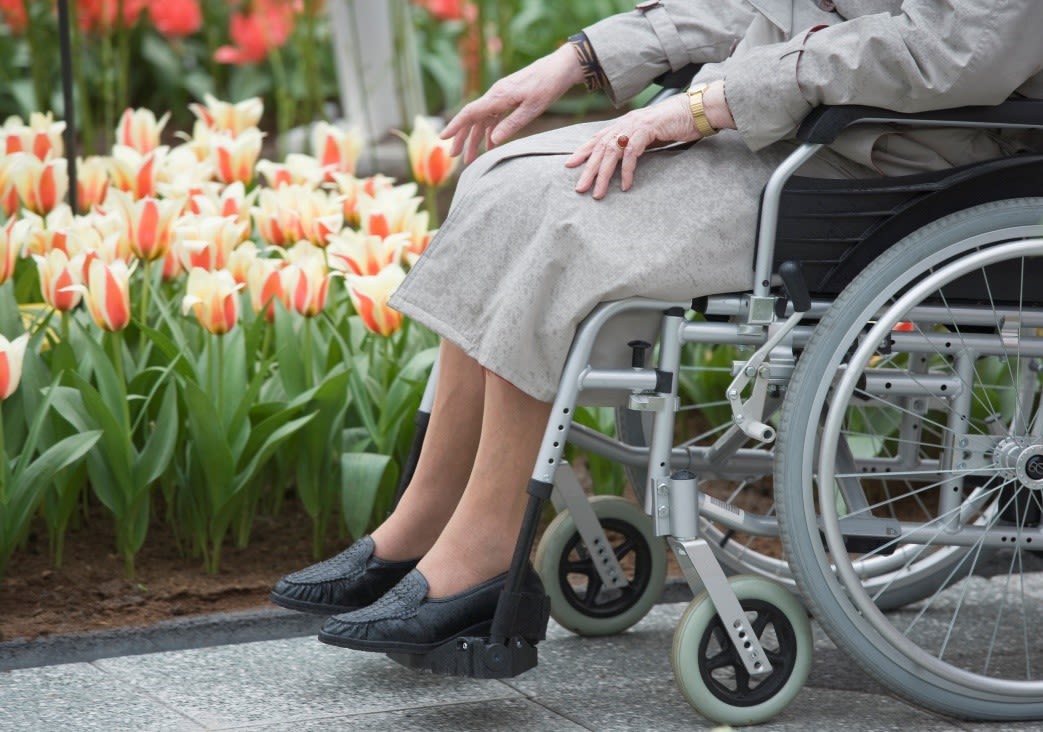 a woman sitting in a wheelchair