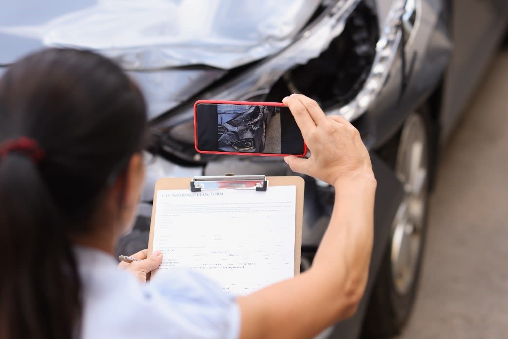 taking picture of car injured