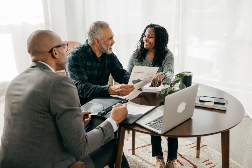 Couple and an attorney having a discussion