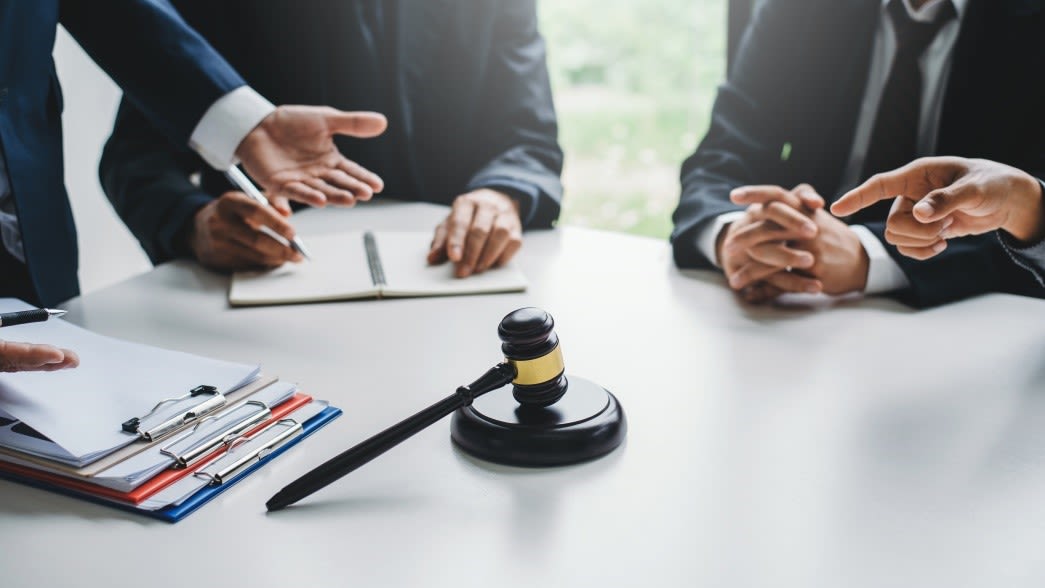 Attorney's table with gabel and block sent with papers