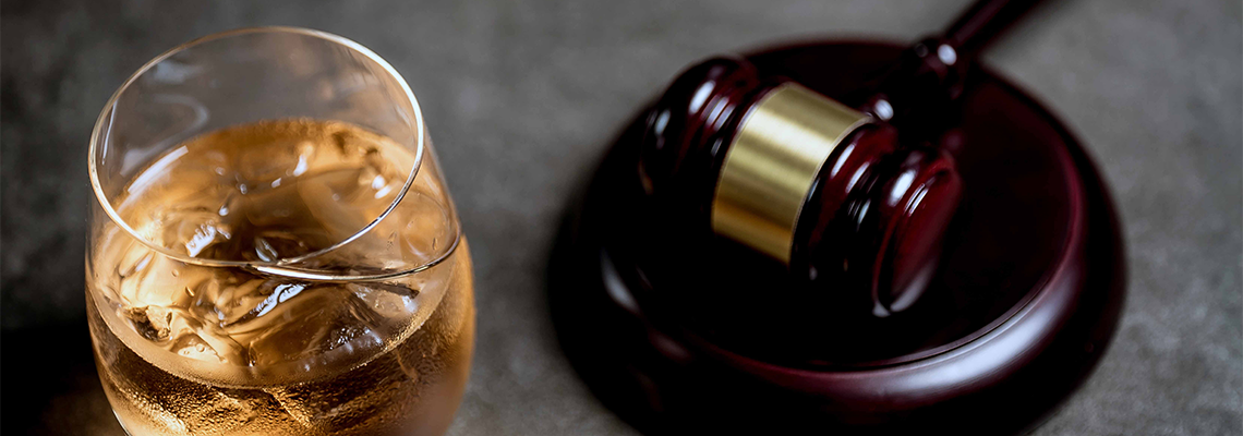 Judge's Gavel and glass of whisky