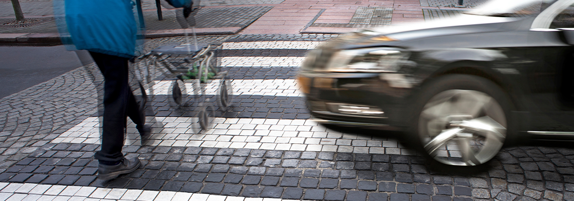 Car about to hit man at dangereous crossing