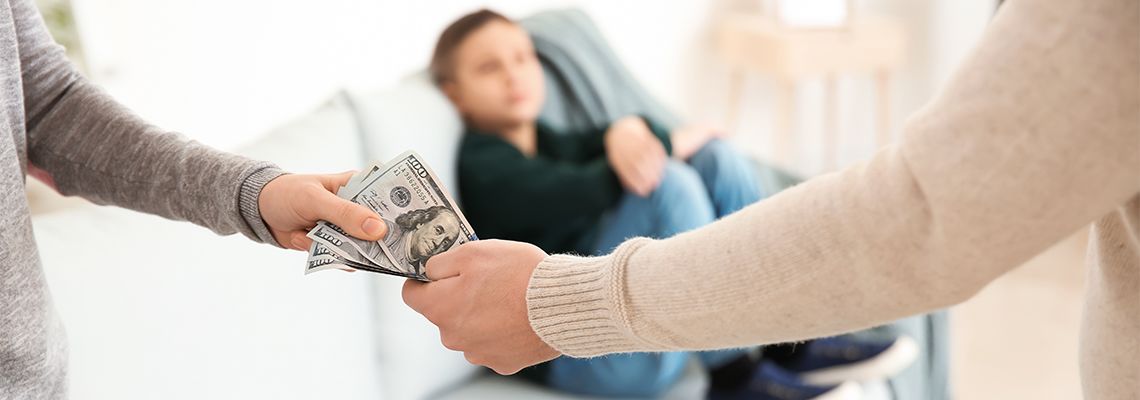 Man giving money to ex-wife as spousal support