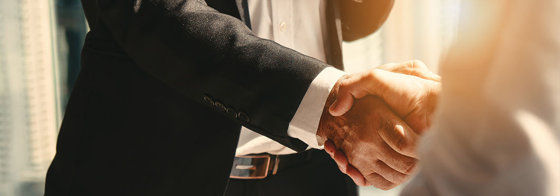 Two men shaking hands