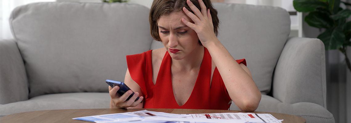 Stressed young woman due to financial problems