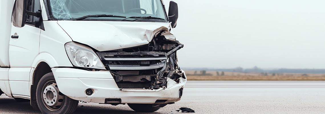 Damaged delivery van after accident