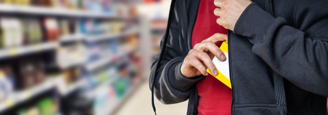 Man stealing from a retail store