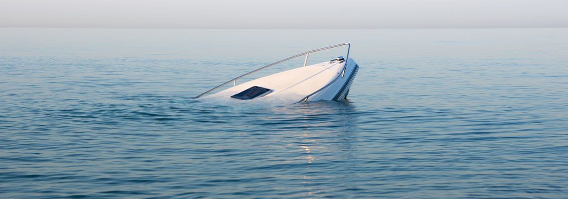 Sinking modern large white boat goes underwater