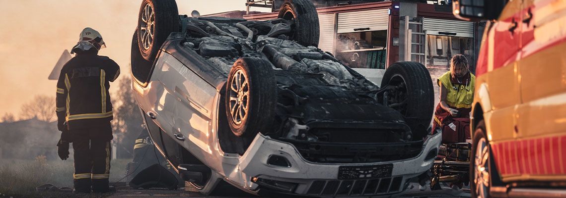 Rollover car accident in highway