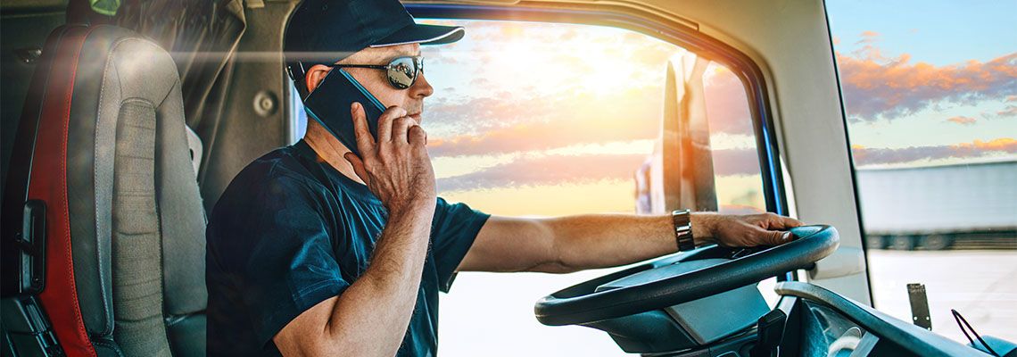 Truck driver talking on phone while driving