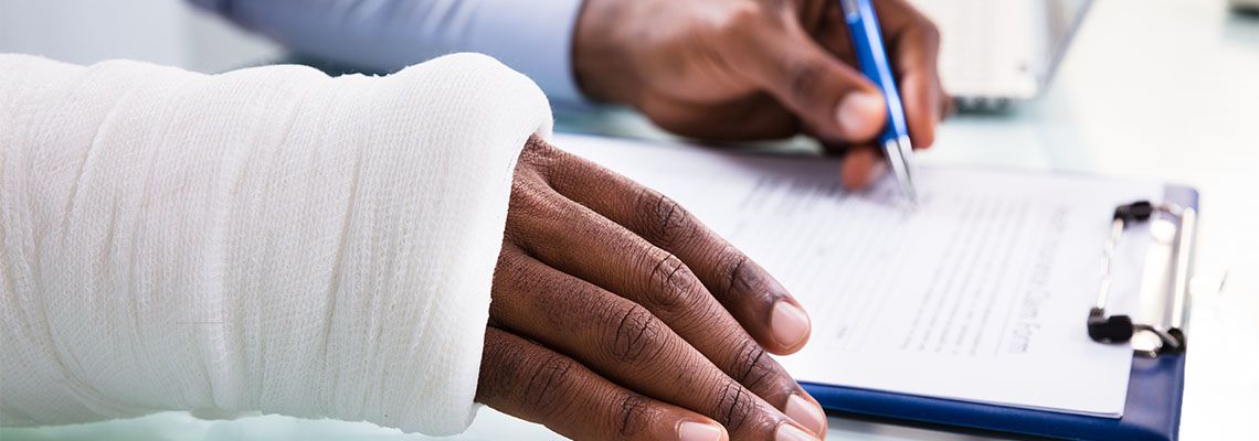Injured Man Filling Form
