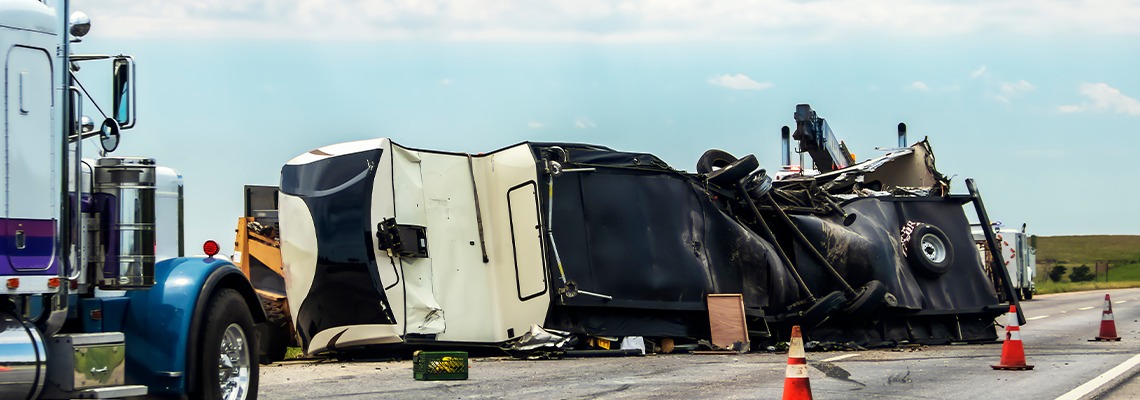 Fifth wheel RV overturned on highway with wench