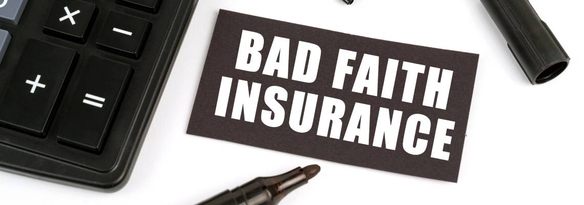 Black plate with inscription Bad Faith Insurance