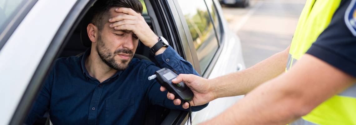 Police stops a man for DUI breath test