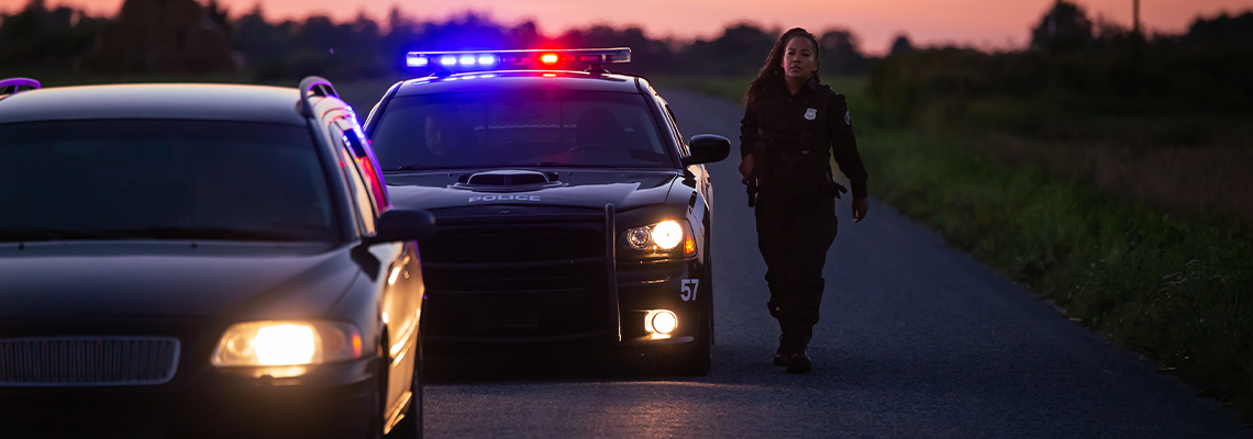 Highway Traffic Patrol Car Pulls over Vehicle on the Road