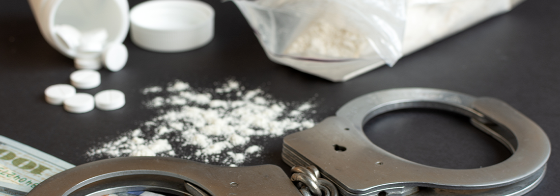 Drugs and Handcuffs Composition